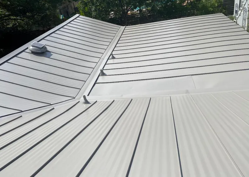 Solar attic fan installed on a metal roof for Roof Ventilation in Rio Vista